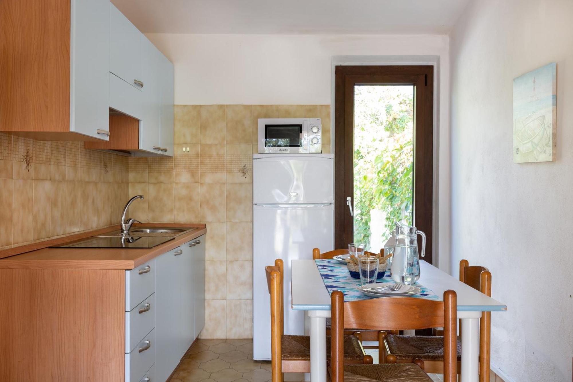 סאן תאודורו Residence Il Melograno מראה חיצוני תמונה